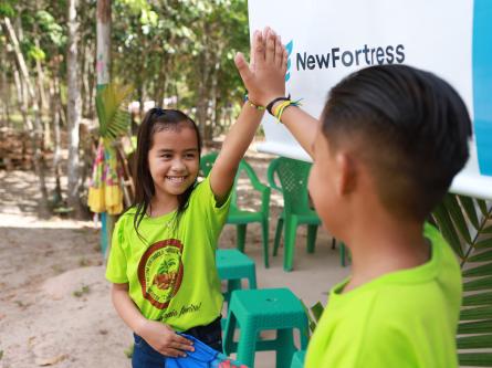 children giving a high five