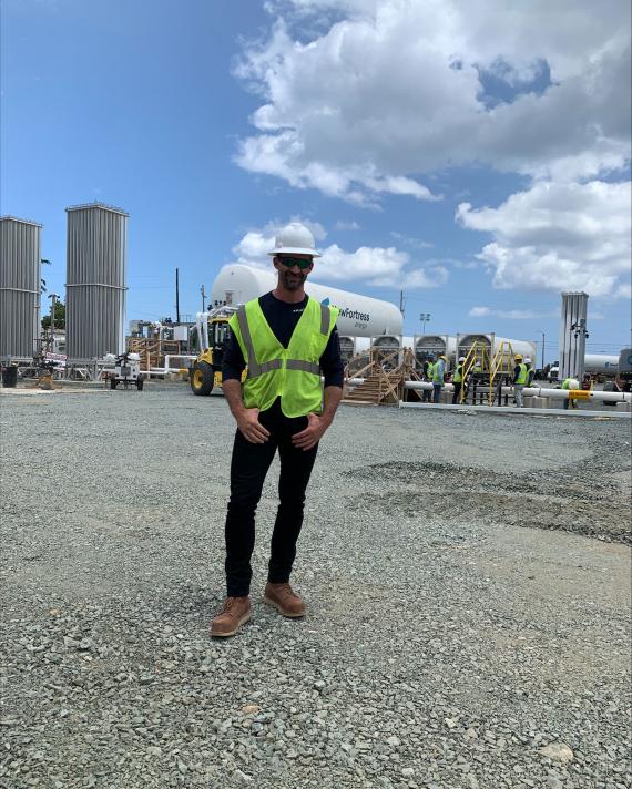 NFE employee standing on LNG plant 