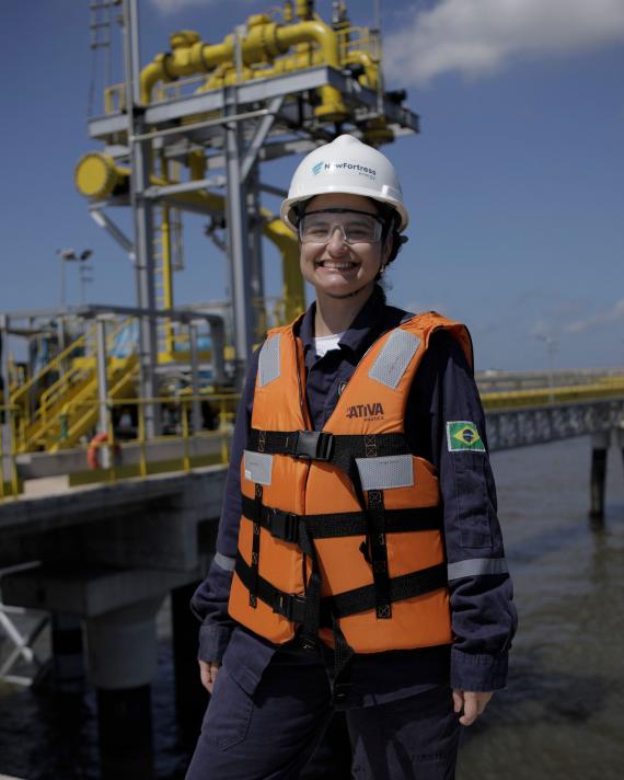 NFE employee standing on LNG plant 