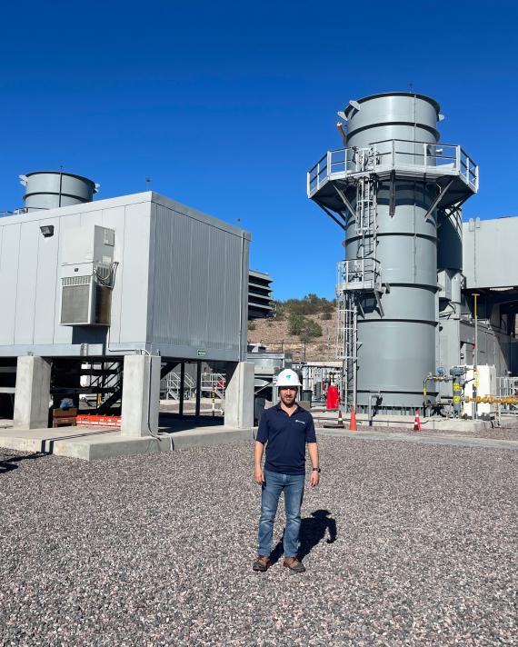 NFE employee standing on LNG plant 