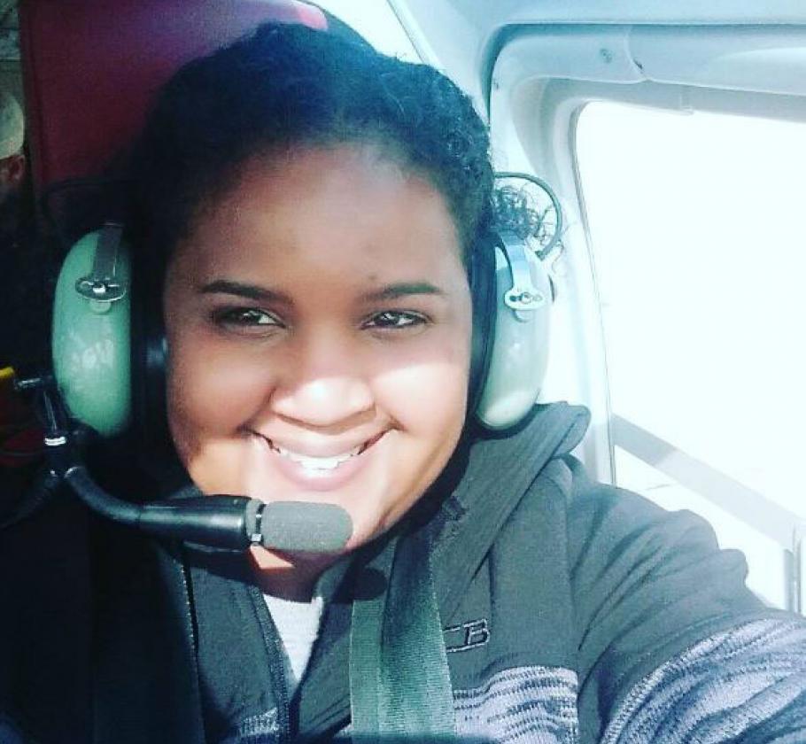 Women smiling on a plane 