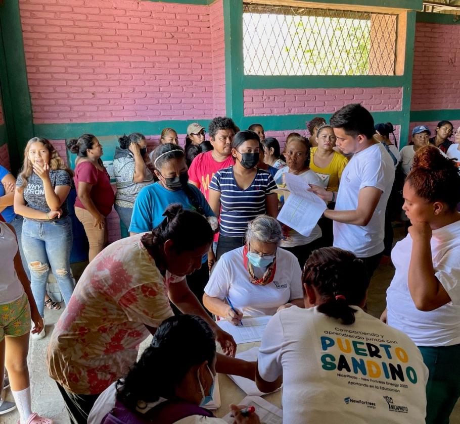 People waiting in line for gift distribution 