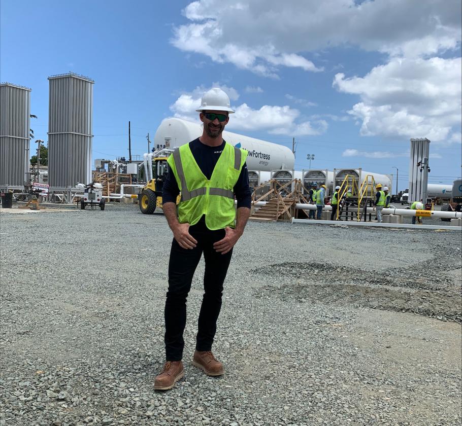 NFE employee standing on LNG plant 