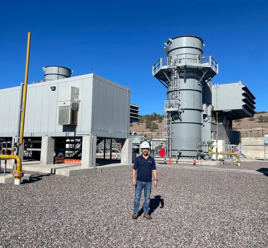 NFE employee standing on LNG plant 