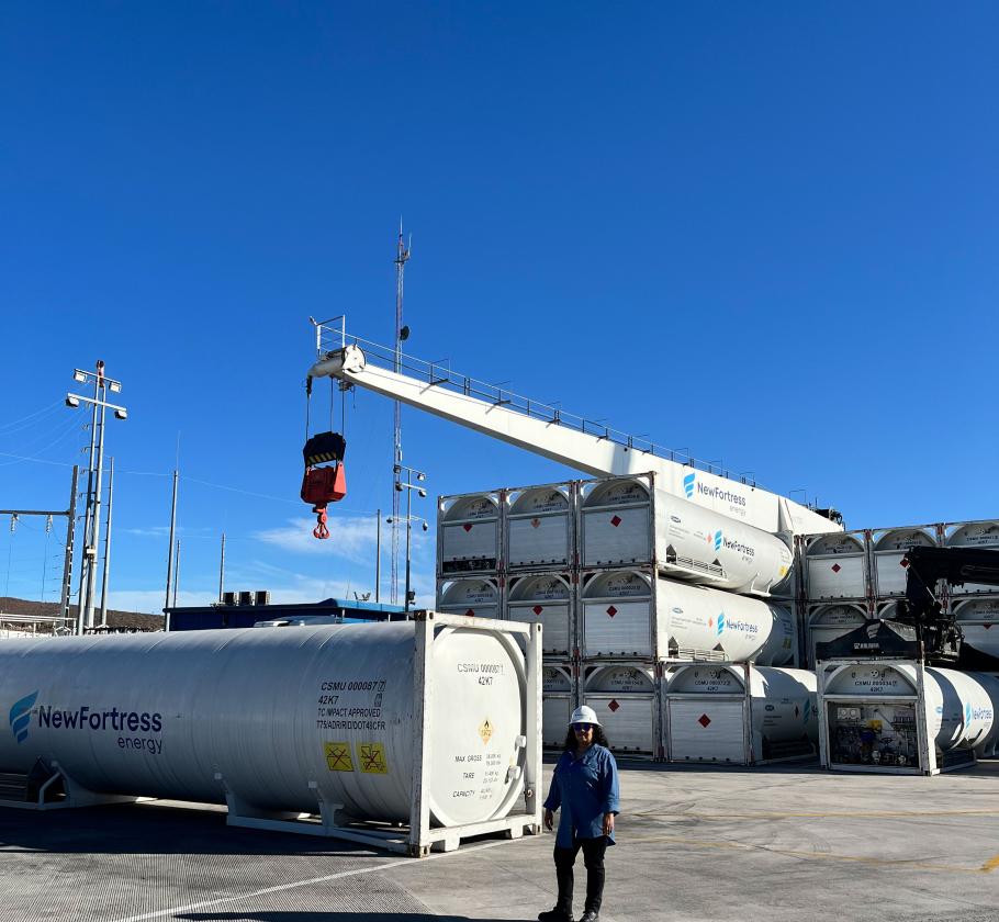 NFE employee standing on LNG plant 